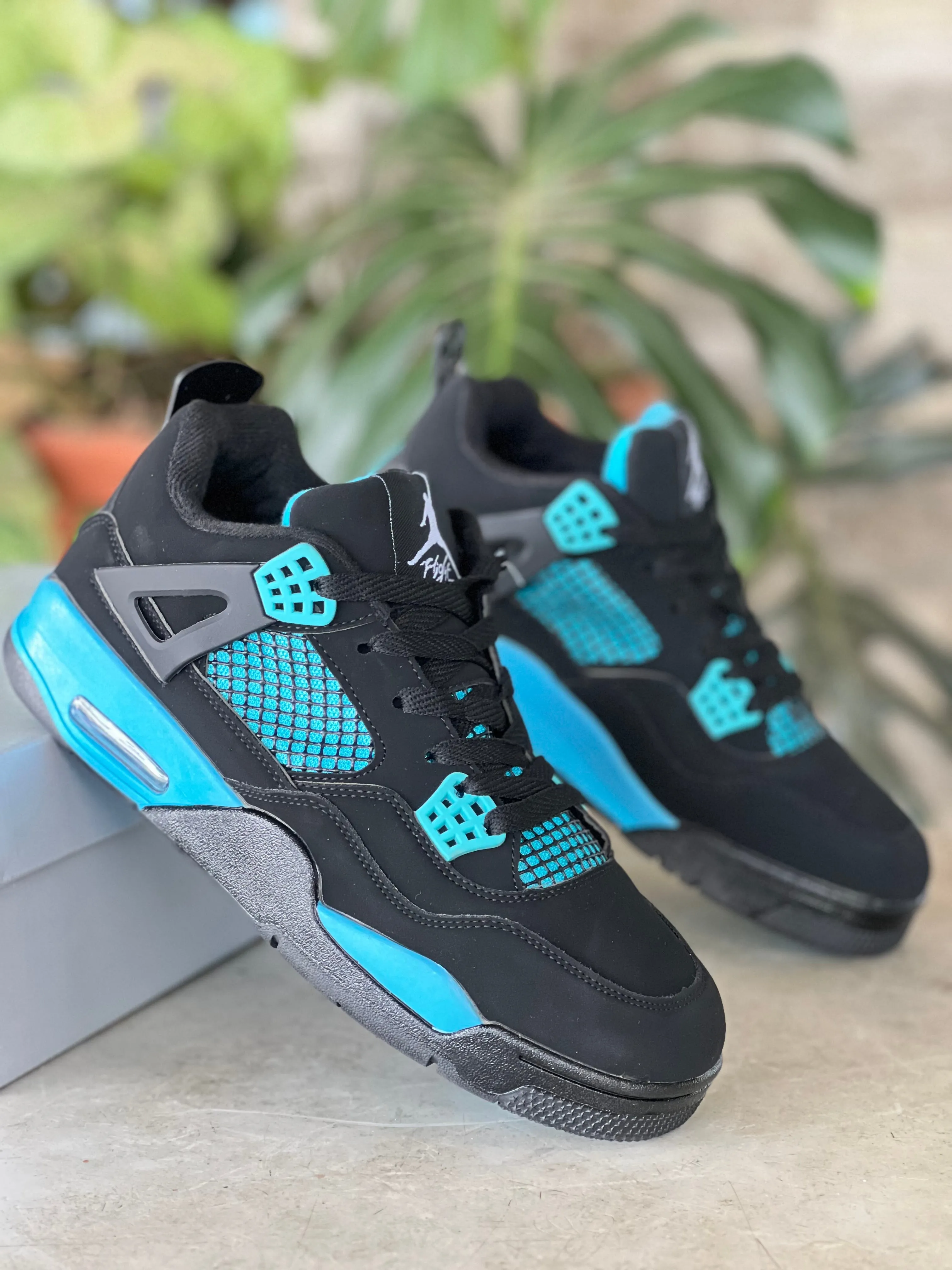 Air Jordan 4 Sneakers - Black/Blue